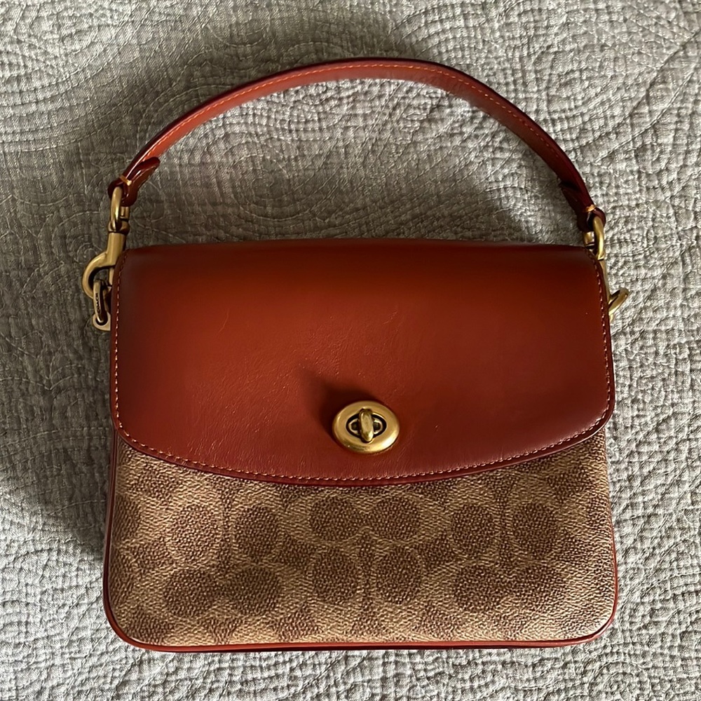 Small Coach bag with two unused changeable straps